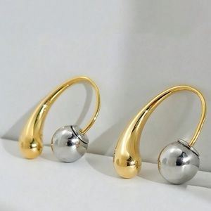 Stunning one-of kind intertwined earrings| Silver and gold plated